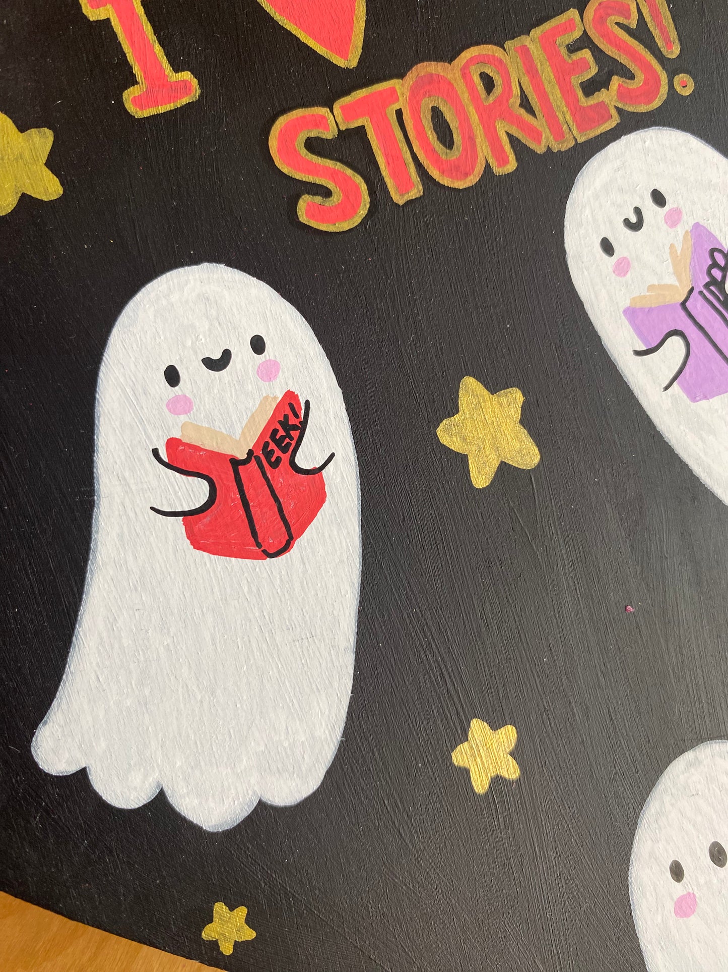 I Love Ghost Stories wooden heart painting
