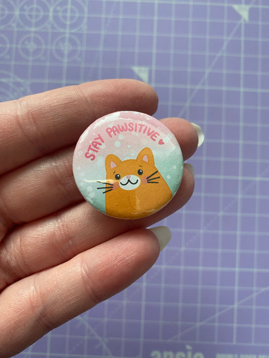 Stay Pawsitive button badge